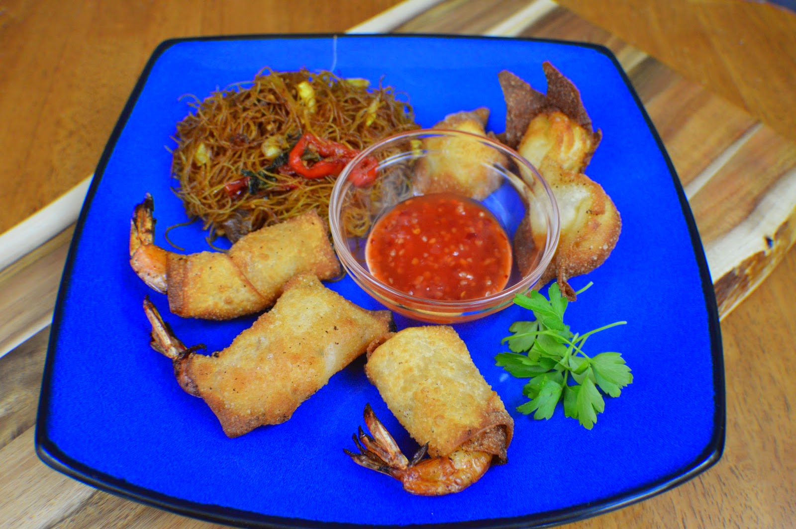 delicious meal with noodles, wontons and firecracker shrimp
