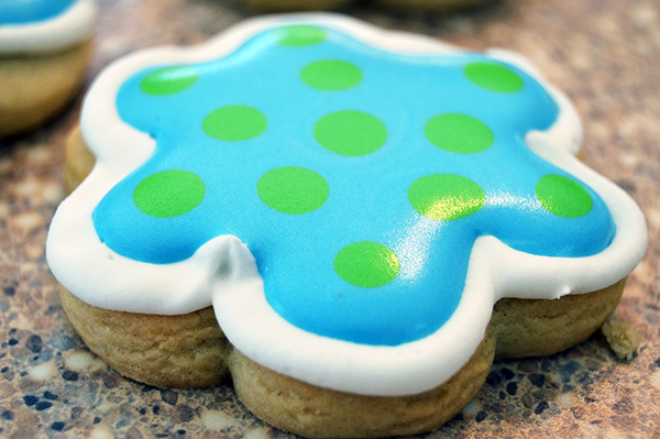 Playful Baby Shower Treats: Polka Dot Cookies with Colorful Icing