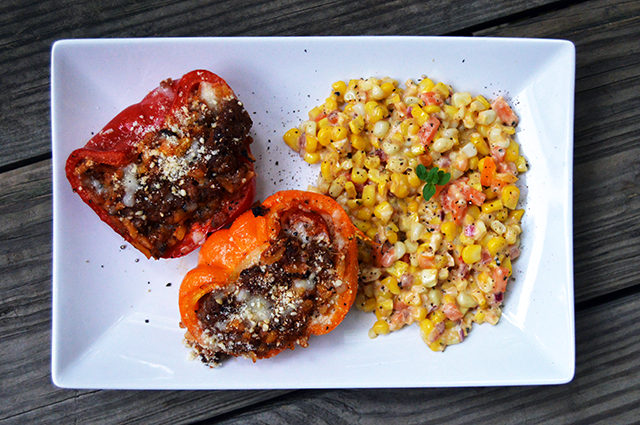 serving of stuffed bison peppers and corn salad