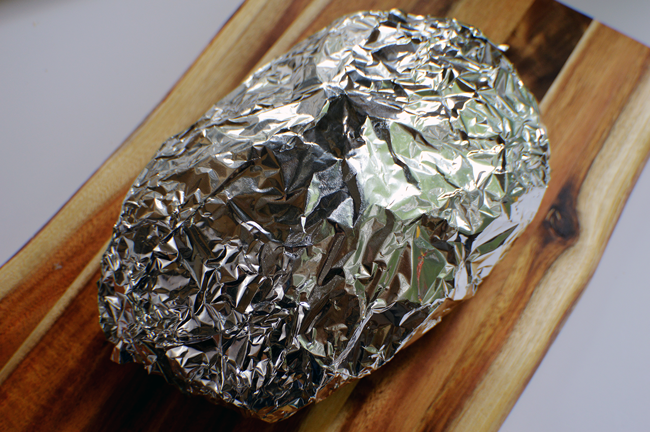 bread wrapped in foil and parchment