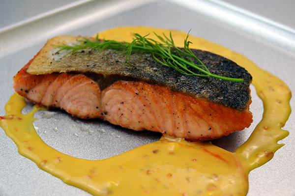 plated salmon with sauce