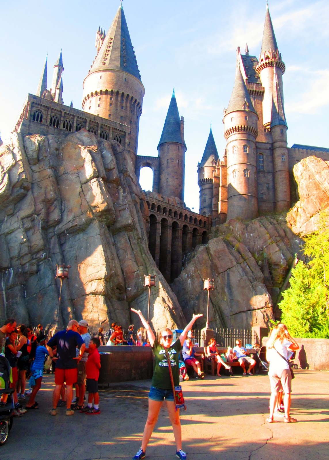 girl standing in front of hogwarts