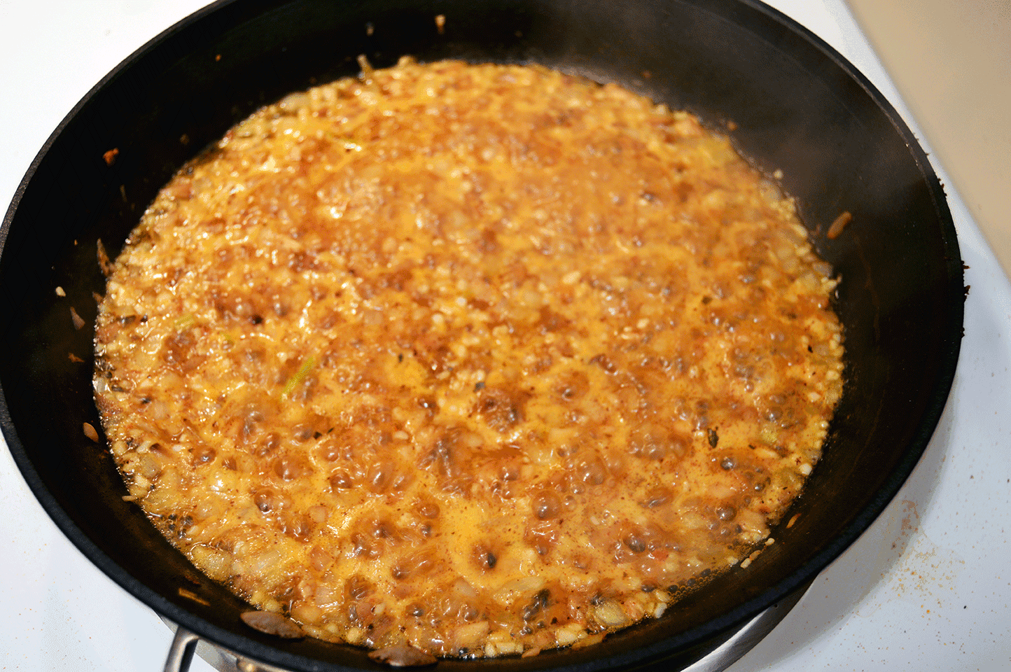 simmering mushrooms and onion