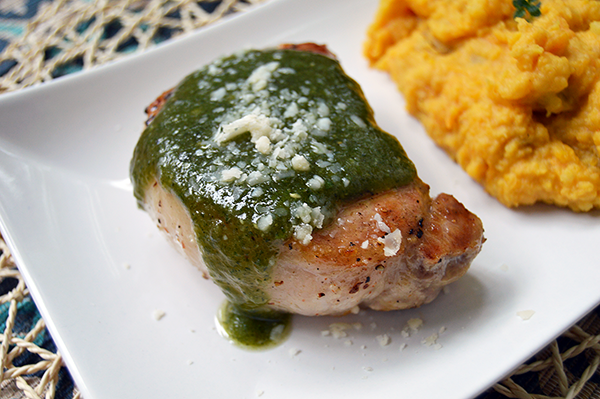 pesto pork chop on plate