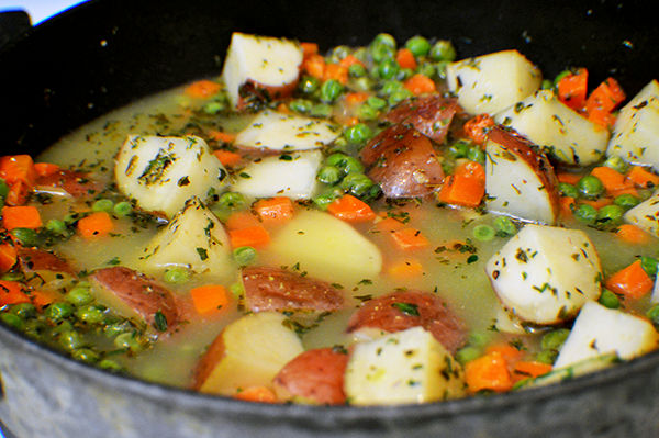 veggies with broth in skillet