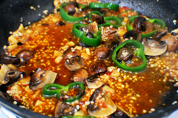 sauce with veggies in pan