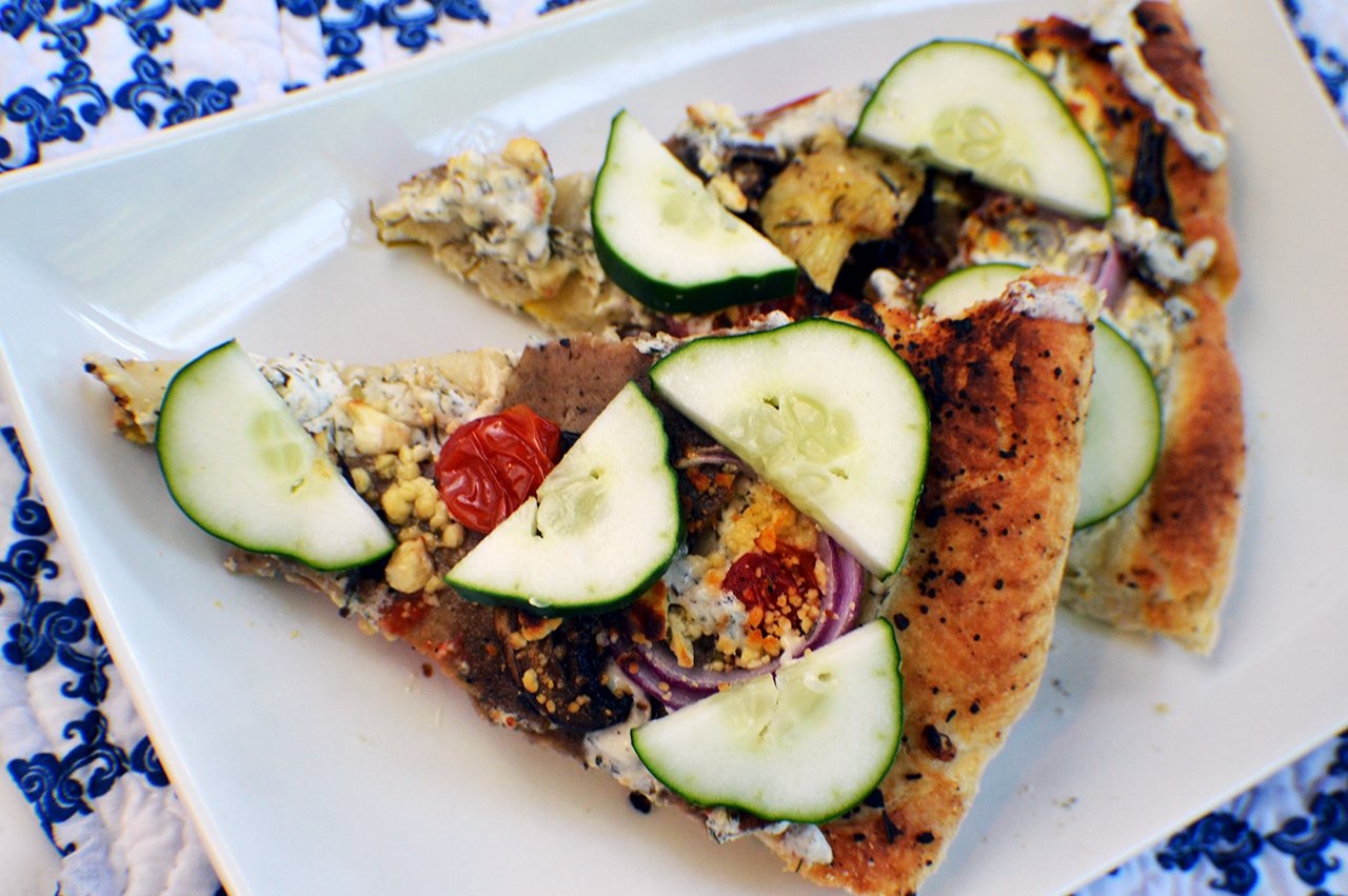 sliced pizza with cucumbers