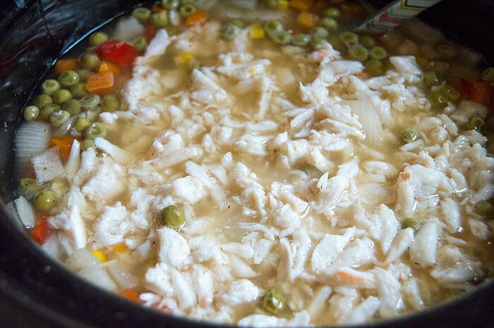 adding crab meat to crock pot