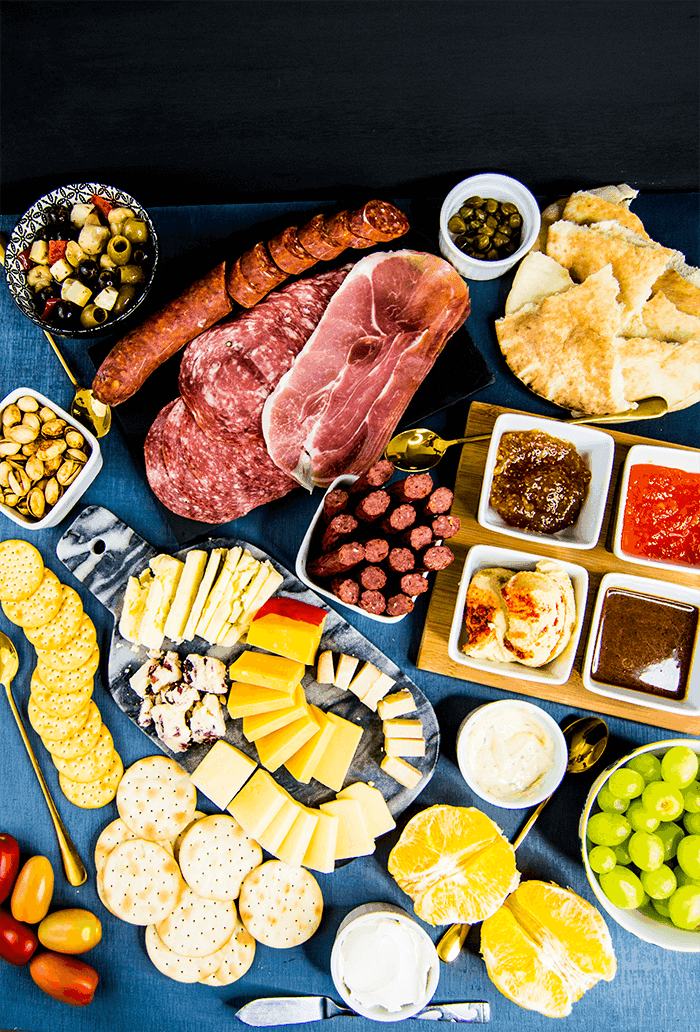 charcuterie spread with meat and jams