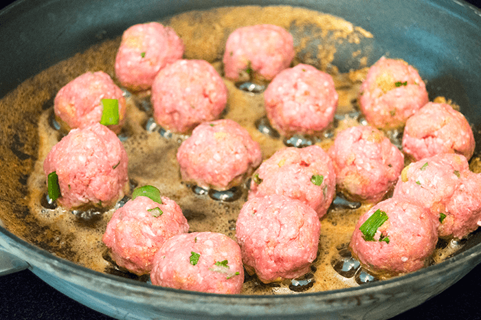 searing lamb meatballs