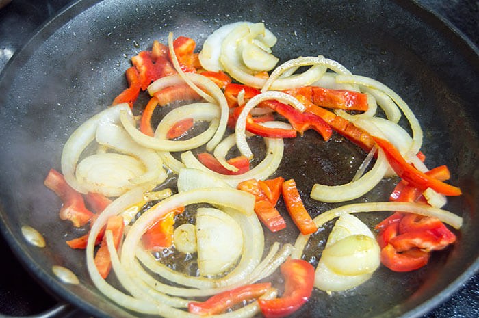 sauting peppers and onions