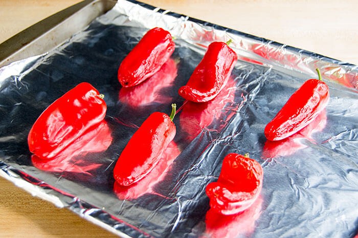 red peppers on baking sheet