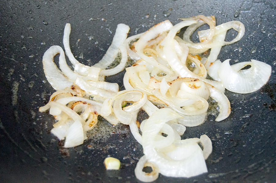 onions in wok