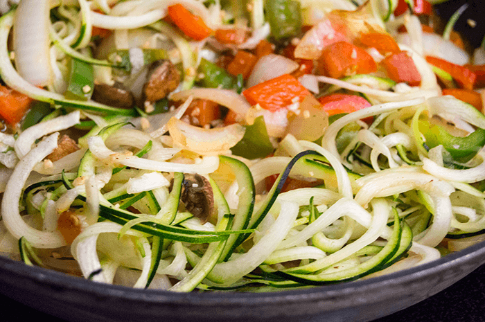 zoodles with onions and peppers