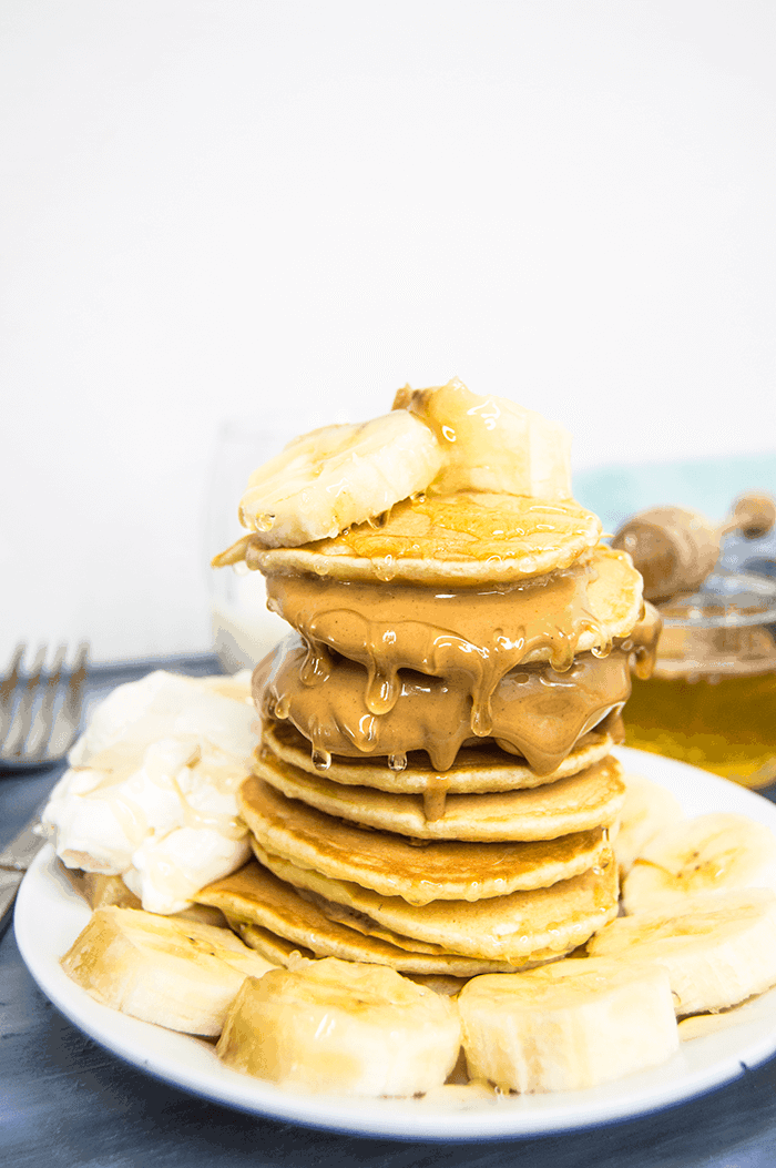 pancake stack with honey and banana